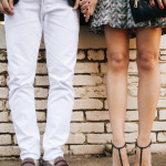 Amy Havins wears a skirt and gucci pumps.