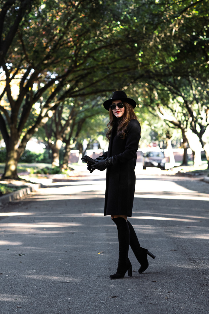Amy Havins of Dallas Wardrobe wears a black coat from Reiss.