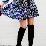 Amy Havins wears a blue floral print Shoshanna dress with Stuart Weitzman over the knee boots.
