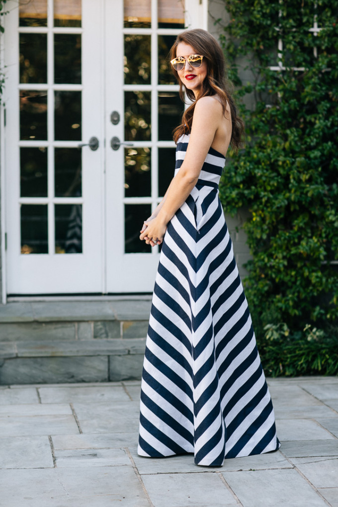 Amy Havins wears a blue and white stiriped shoshanna midnight evening dress.