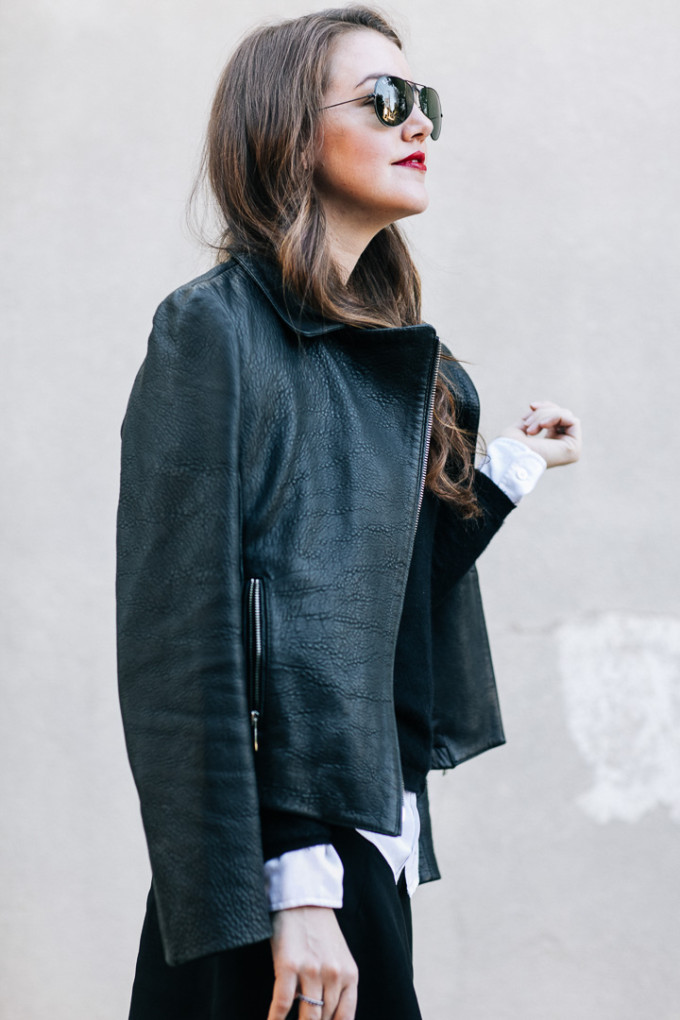 Amy Havins wears all black paired with stuart weitzman over the knee highland boots.