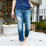 Dallas blogger Amy Havins wears 7 For All Mankind Jeans.