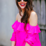 Dallas Blogger Amy Havins wears an Amanda Uprichard off the shoulder pink mini dress.