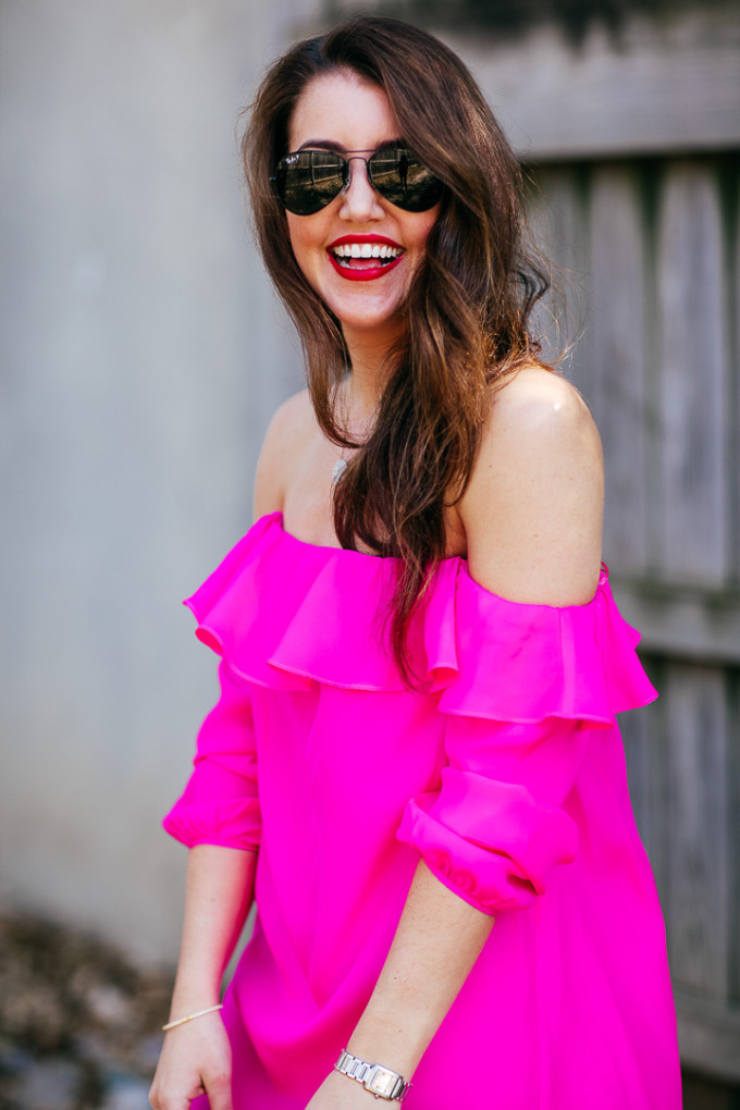 Dallas Blogger Amy Havins wears an Amanda Uprichard off the shoulder pink mini dress.