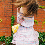 Dallas Blogger Amy Havins wears a printed off the shoulder shoshanna dress.