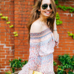 Dallas Blogger Amy Havins wears a printed off the shoulder shoshanna dress.