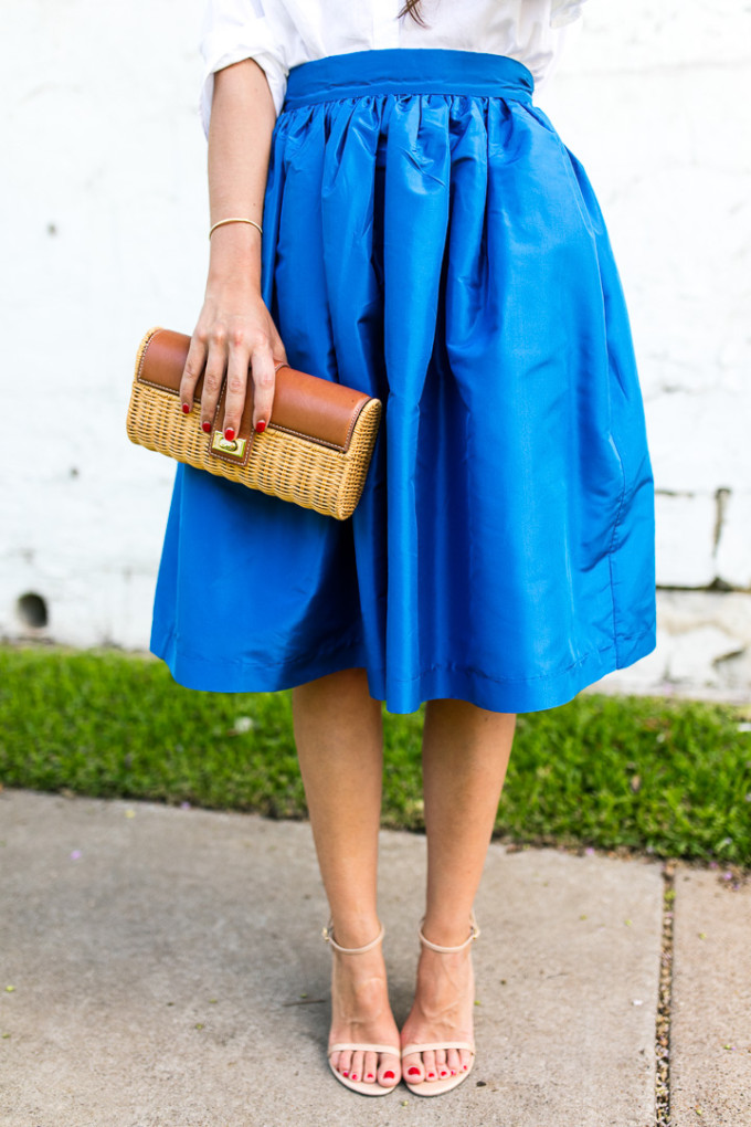 Amy Havins wears a blue lady length party skirt.