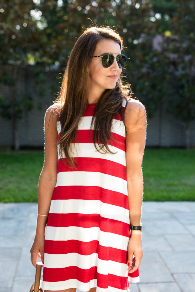 Amy Havins wears a red and white striped dress from Charming Charlie.