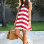 Amy Havins wears a red and white striped dress from Charming Charlie.