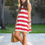 Amy Havins wears a red and white striped dress from Charming Charlie.