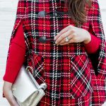 Amy Havins wears a tartan cape from Talbots.