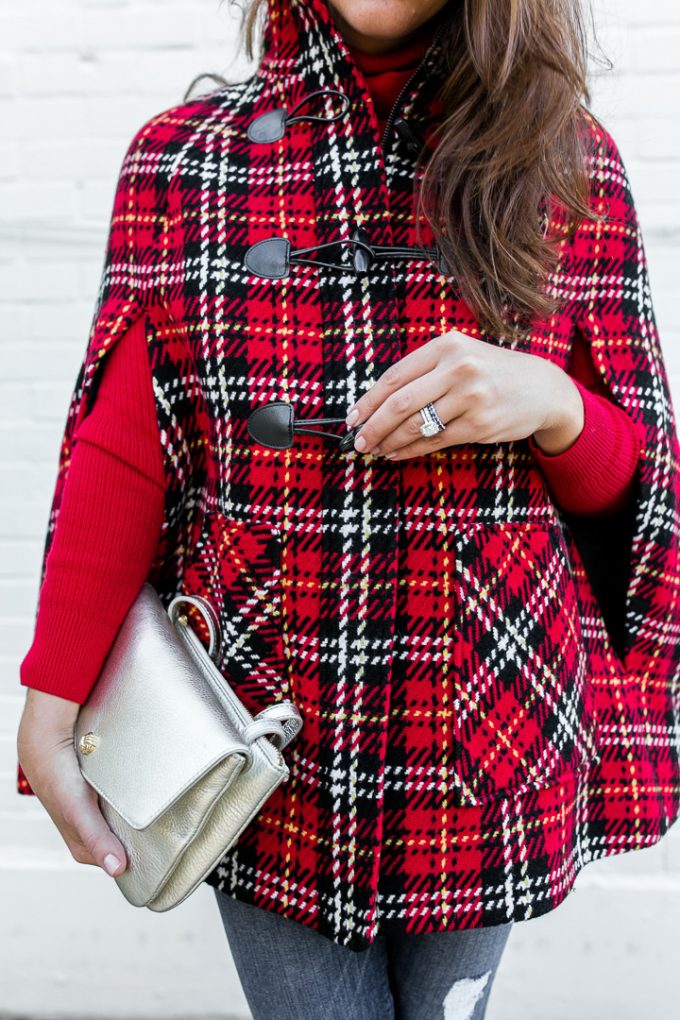 Amy Havins wears a tartan cape from Talbots.