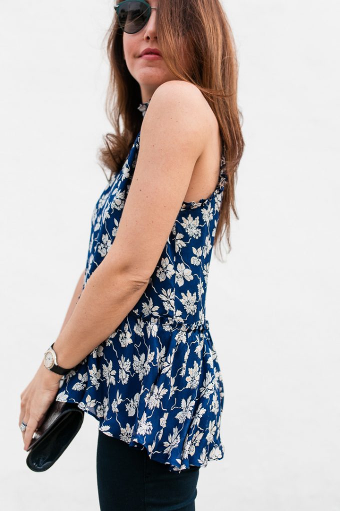 Amy Havins wears a printed blue Shoshanna dress and skinny jeans.