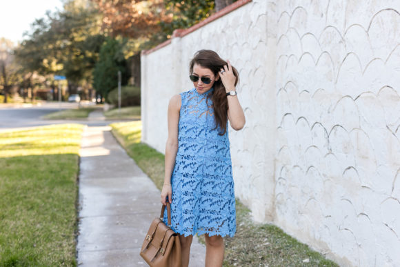 Amy Havins wears a baby blue lace dress with stuart weitzman nude heels.