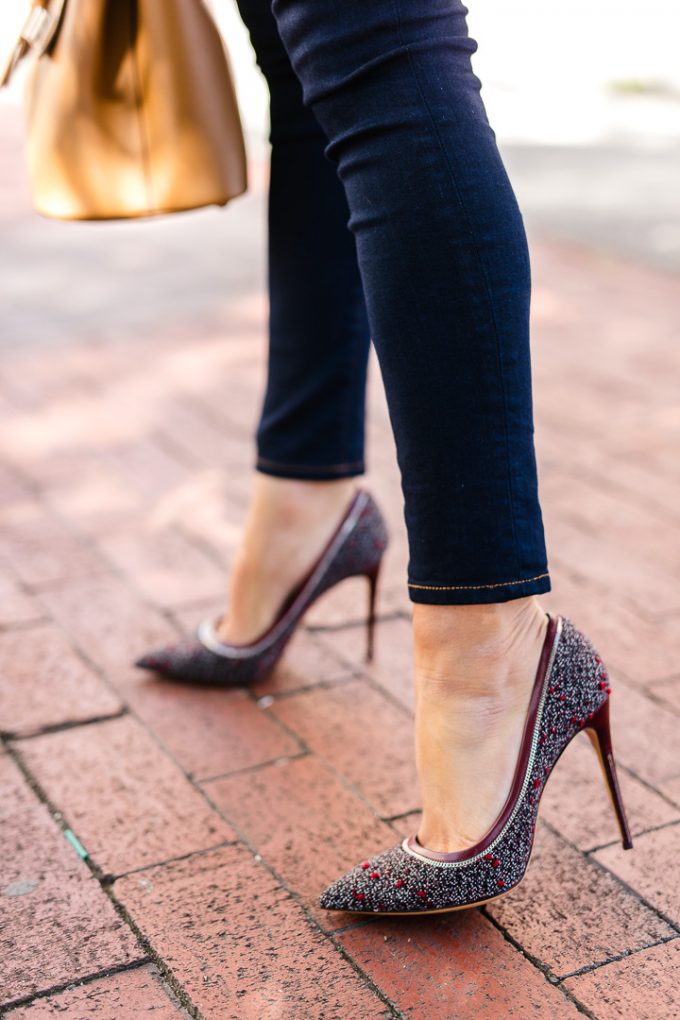 Amy Havins wears jeans and classic pumps.