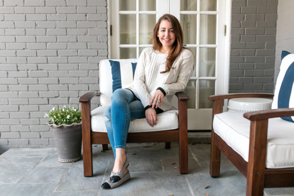 Amy Havins wears denim and a blouse from Stitch Fix.