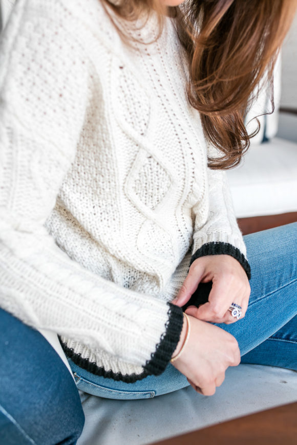 Amy Havins wears denim and a blouse from Stitch Fix.