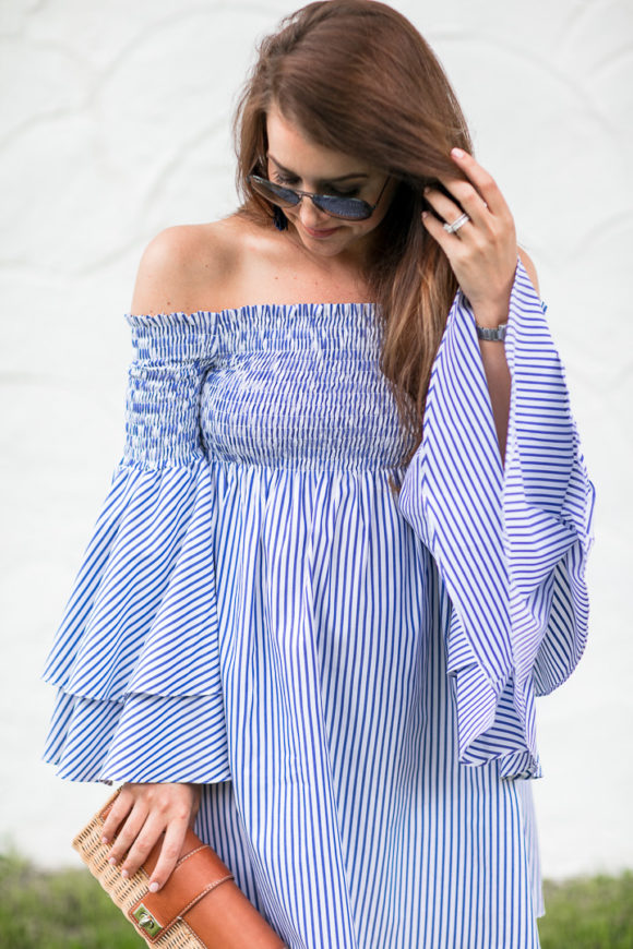 Amy Havins wears a blue and white striped caroline constas dress.