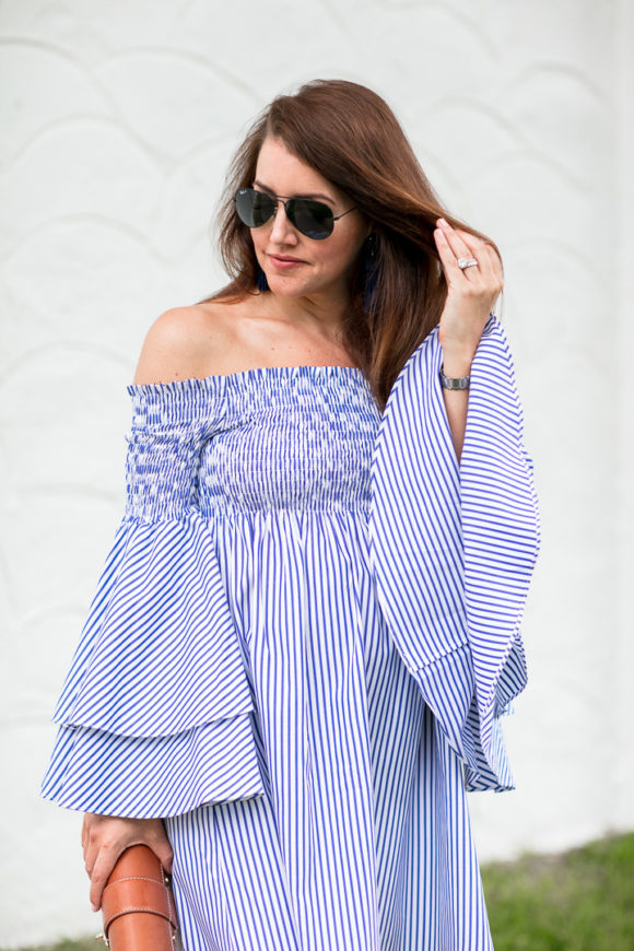 Amy Havins wears a blue and white striped caroline constas dress.