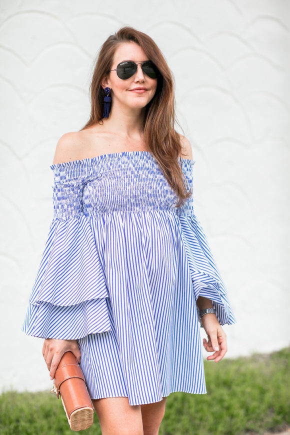 Amy Havins wears a blue and white striped caroline constas dress.