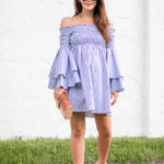 Amy Havins wears a blue and white striped caroline constas dress.