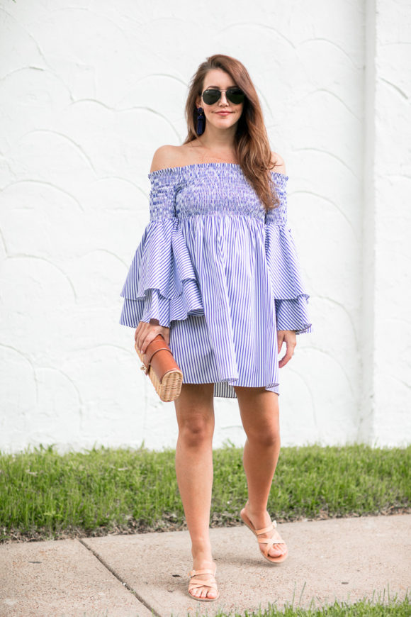 Amy Havins wears a blue and white striped caroline constas dress.