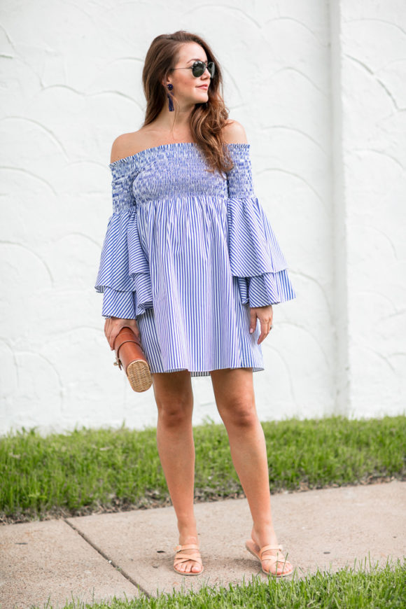 Amy Havins wears a blue and white striped caroline constas dress.