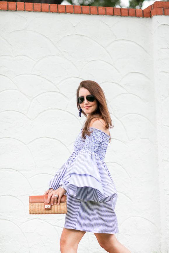 Amy Havins wears a blue and white striped caroline constas dress.