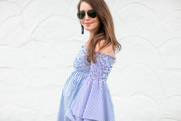 Amy Havins wears a blue and white striped caroline constas dress.