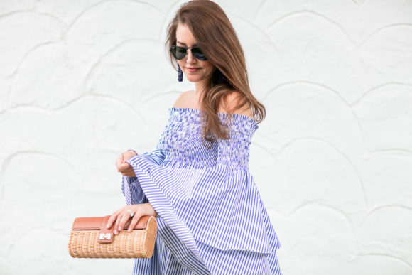 Amy Havins wears a blue and white striped caroline constas dress.