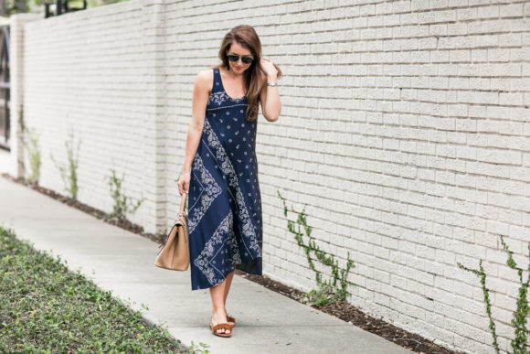 Amy Havins wears a navy shift dress with a bandana print.