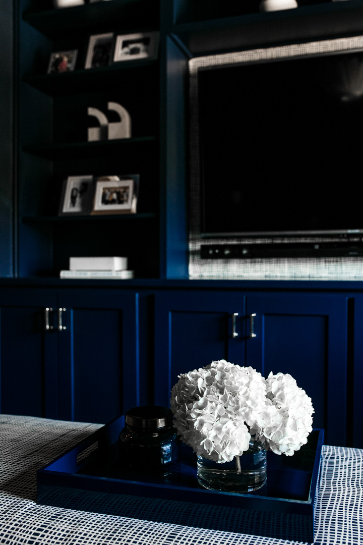 Amy Havins shares her blue and white upstairs tv room.