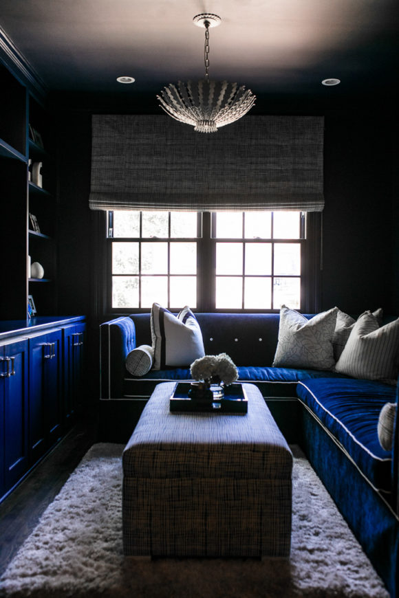 Amy Havins shares her blue and white upstairs tv room.