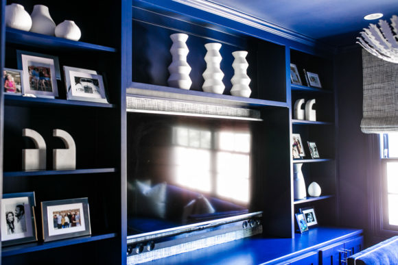 Amy Havins shares her blue and white upstairs tv room.