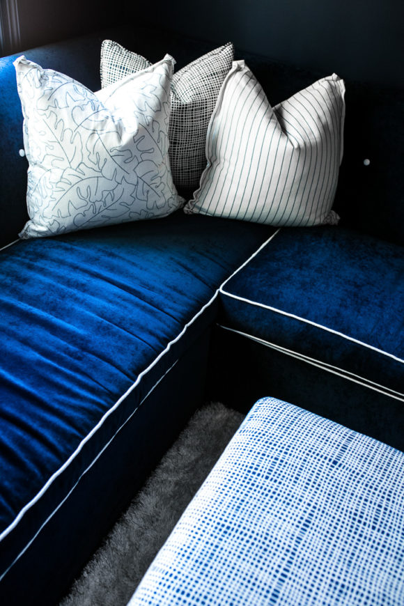 Amy Havins shares her blue and white upstairs tv room.