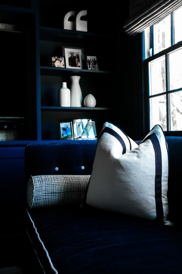 Amy Havins shares her blue and white upstairs tv room.