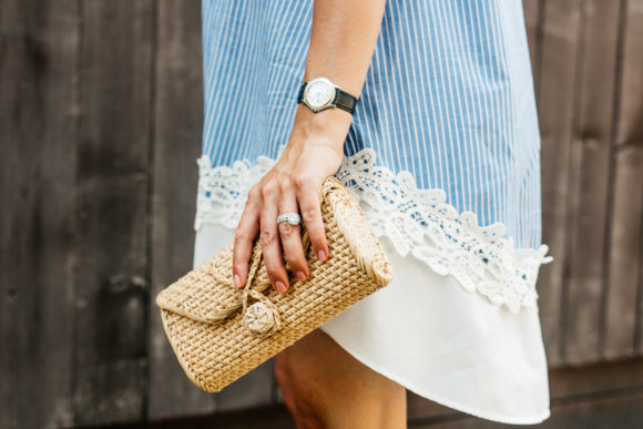 Amy Havins wears a blue and white striped shirtdress.