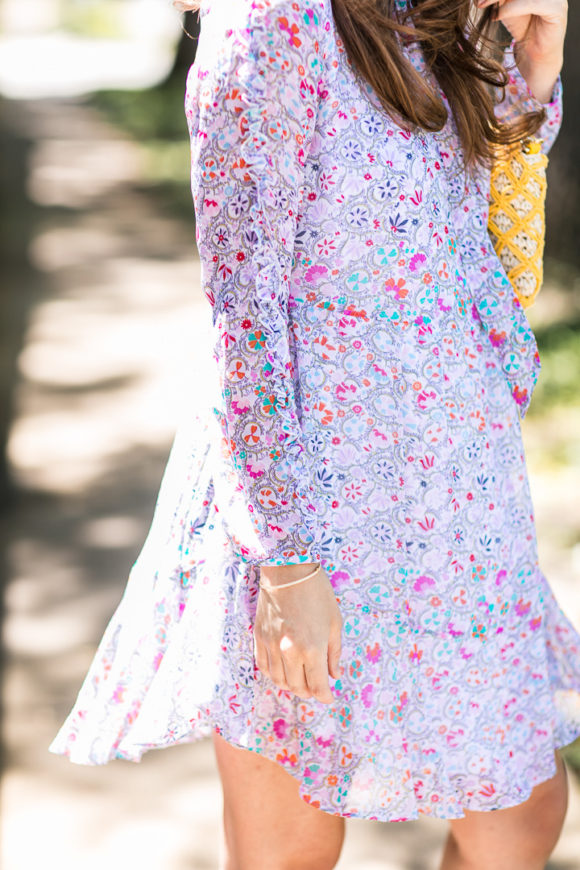 Amy Havins wears a Shoshanna floral print summer dress.