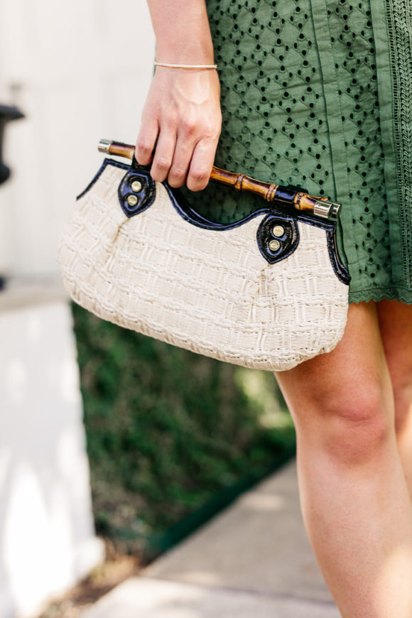 Amy Havins wears a green shift dress.