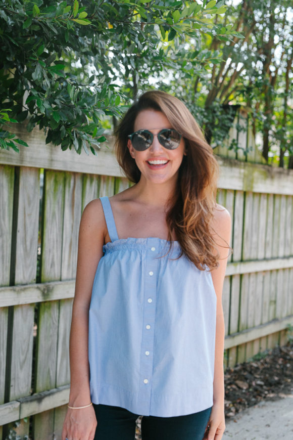 Amy Havins wears a pinstriped top and jeans.