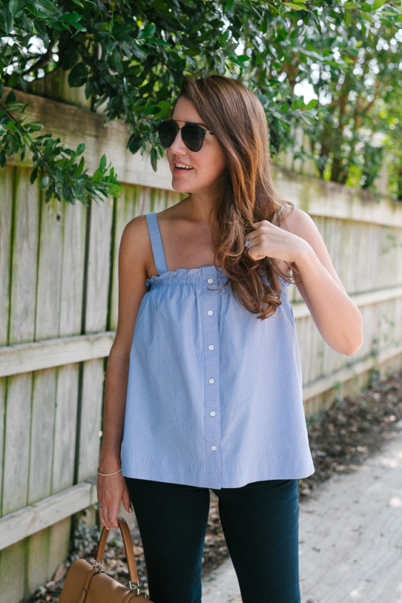 Amy Havins wears a pinstriped top and jeans.