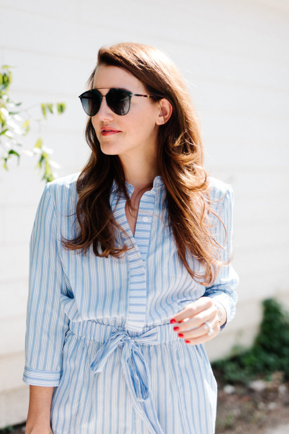 Amy Havins wears a blue and white romper.