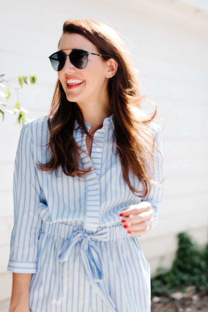 Amy Havins wears a blue and white romper.