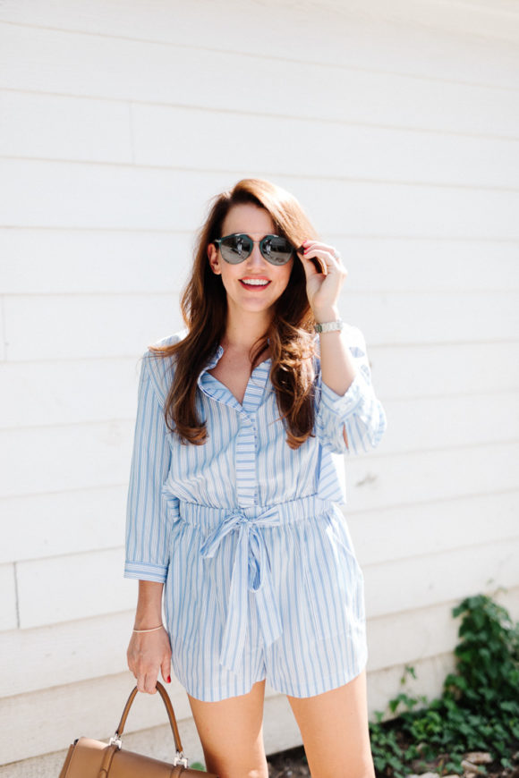 Amy Havins wears a blue and white romper.