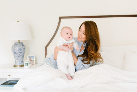 amy havins shares her morning routine with baby ralph and wearing a blue and white sleep shirt.