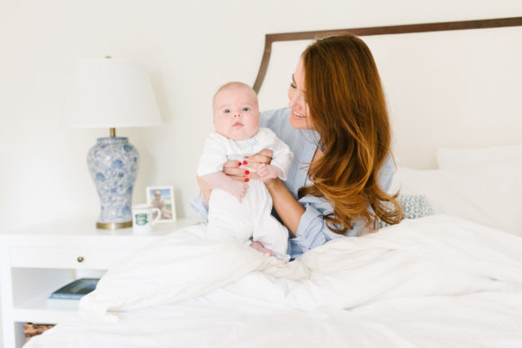 amy havins shares her morning routine with baby ralph and wearing a blue and white sleep shirt.