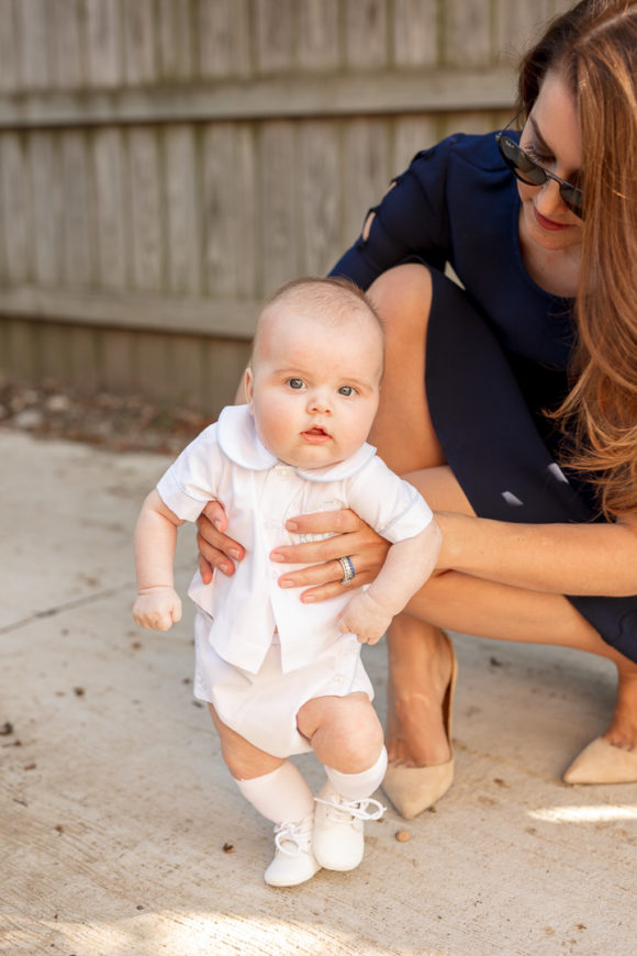 Amy Havins wears a navy shoshanna dress with baby ralph.