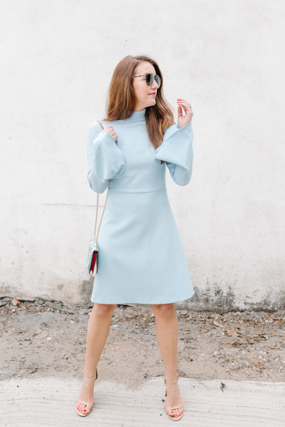 Amy Havins wears a powder blue shoshanna dress.