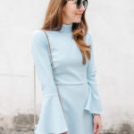 Amy Havins wears a powder blue shoshanna dress.