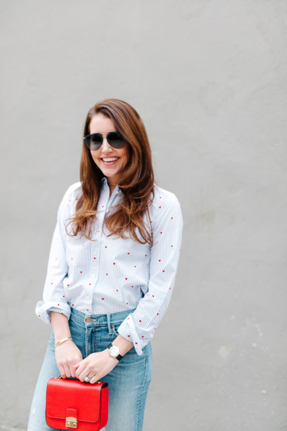 Amy Havins wears jeans and a button down.